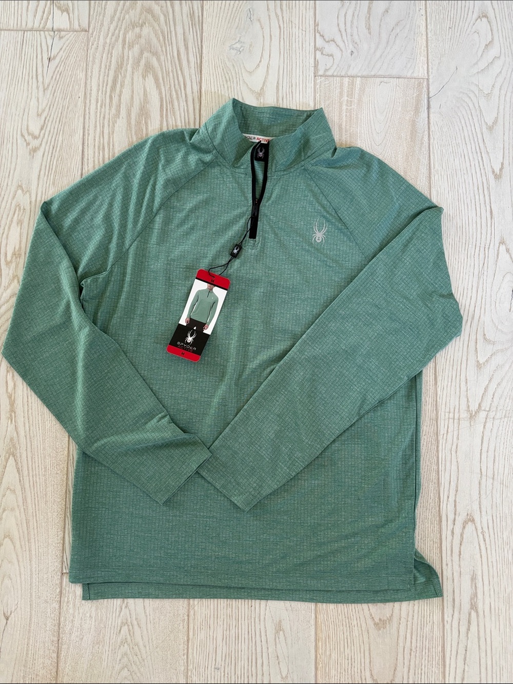 Men’s size medium Spyder NWT 1/4 zip.